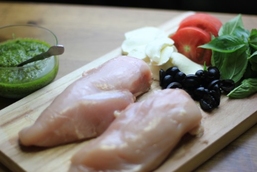 My PCOS Kitchen - Hasselback Chicken Caprese - A chicken breast sliced and stuffed with fresh mozzarella, pesto, tomatoes, basil and olives. Keto/low carb