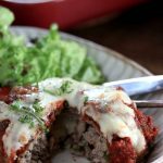 My PCOS Kitchen - Keto Cheese-Stuffed Giant Meatballs - These gluten-free and low carb mega meatballs are stuffed with gooey mozzarella cheese and topped with an herbed marinara sauce.