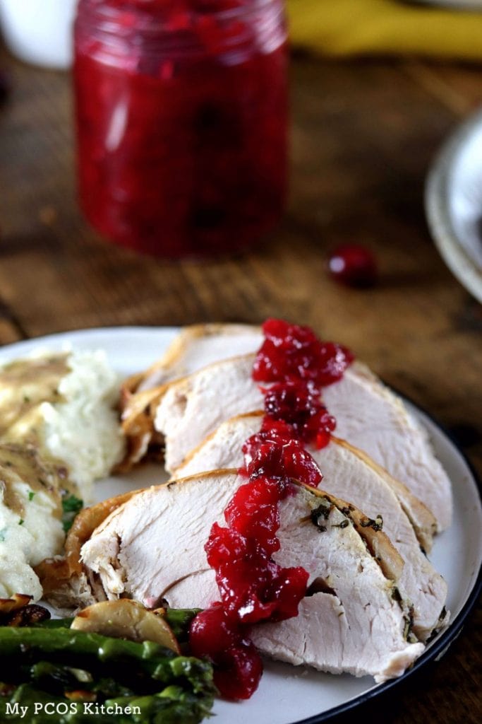 My PCOS Kitchen - Sugar-free Low Carb Cranberry Sauce- Cranberry Sauce over sliced turkey breast. Low carb