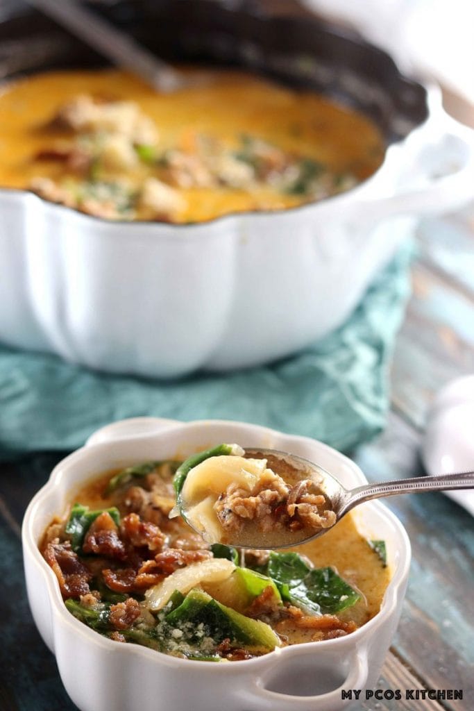 Low Carb Olive Garden Zuppa Toscana - My PCOS Kitchen - A silver spoon filled with soup