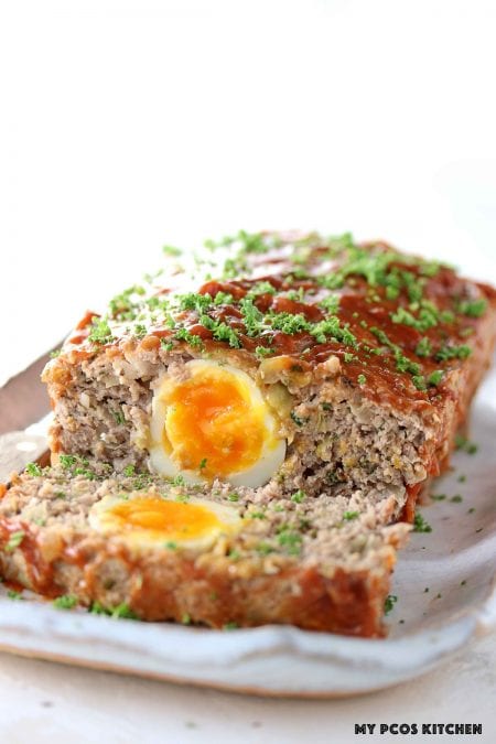Keto Meatloaf with Eggs - My PCOS Kitchen - a low carb meatloaf stuffed with hard boiled eggs.