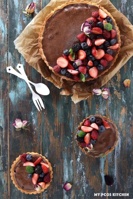 Low Carb No Bake Chocolate Tart with Raspberries - My PCOS Kitchen - An overhead photograph of a chocolate tart.