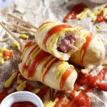 Gluten Free Corn Dogs - My PCOS Kitchen - Delicious dairy free corn dogs topped with ketchup and mustard.