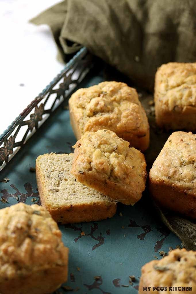 A picture of a keto biscuit that's sliced on a metal tray. 